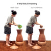 Pair of Daily Dump Prithvi Khambas home composters in outdoor garden with young girl adding kitchen waste to one.