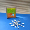Bamboo cotton earbuds box with lots of earbuds visible and three outside against corrugated background