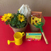 Daily Dump Green Gang Kit with materials and flowers in a coir pot