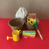 Daily Dump Green Gang Kit with materials and flowers in a coir pot