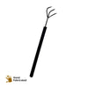 Daily Dump short metal hand rake 3 prong for composting and gardening on corrugated background