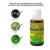 Daily Dump Neem Oil 100ml bottle in foreground and corrugated background