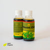 Daily Dump Neem Oil 100ml bottle in foreground and corrugated background