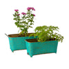 set of 2 long teal metal pots with plants ideal for indoor and outdoor use