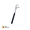 Daily Dump short metal hand rake 3 prong for composting and gardening on corrugated background