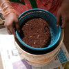 Daily Dump Plastic Sieve top view on a corrugated background