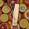 mood shot of Steel straw set 8 inch length with 2 straws and cleaning brush in cotton pouch 