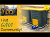 pair of Daily Dump Gaia OWC bulk composters outside apartment building for composting kitchen waste 